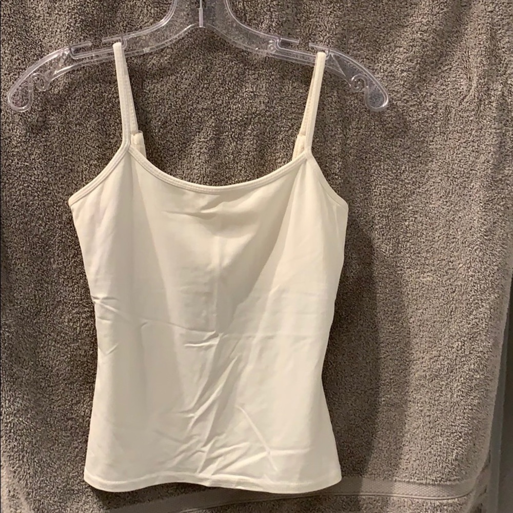 White House Black Market cream color tank top.